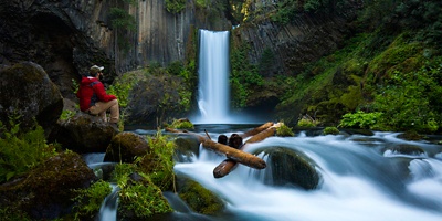 A man sitting next to Toketee Falls