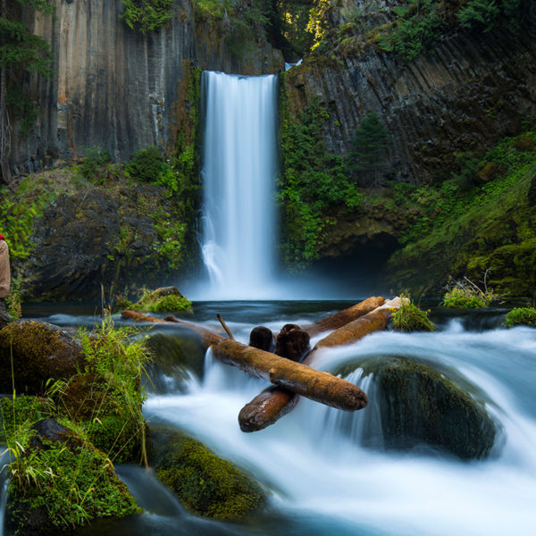 A man sitting next to Toketee Falls