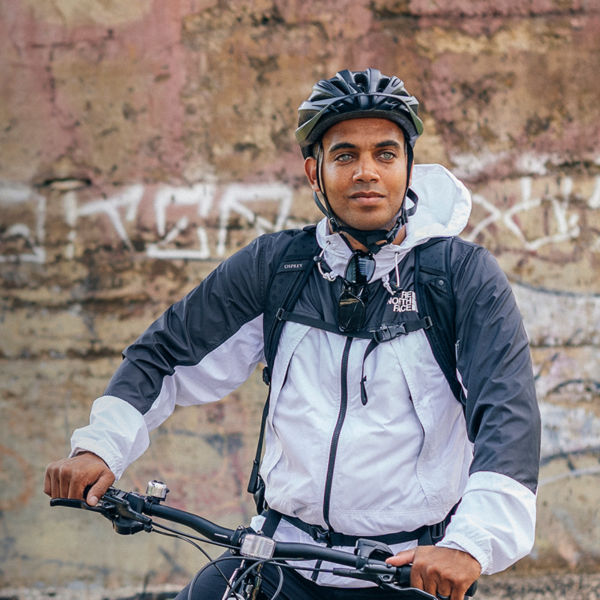 A man sits on his bike