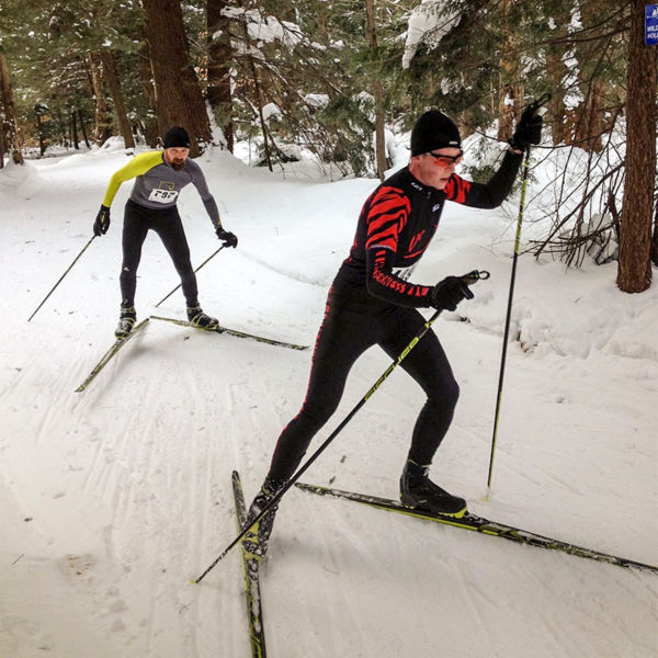 Cross country skiers ski on trails at The Wilderness Lodge