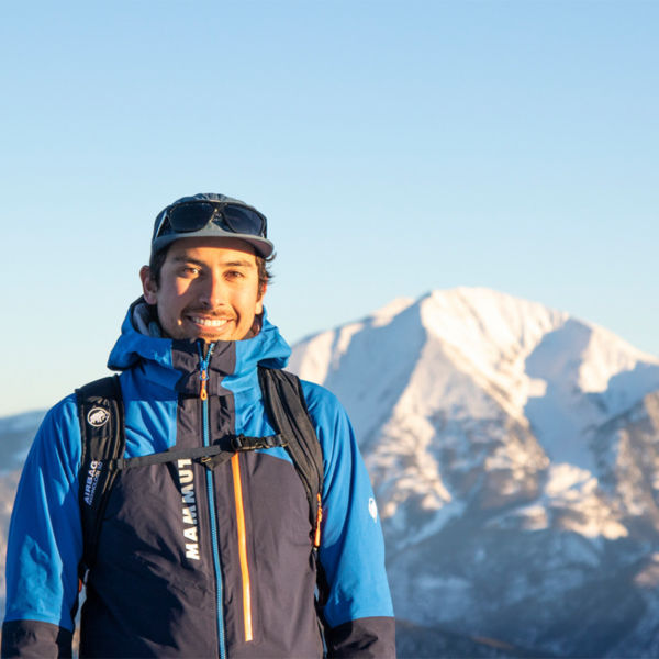 Aidan Goldie poses out on the mountain