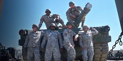 Davon Goodwin poses with fellow soldiers  