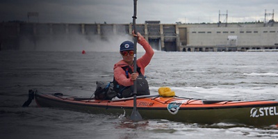 The Grand Salmon women pose with their kayaks 