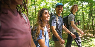 A group of friends hike together