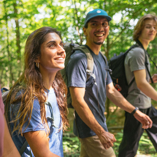 A group of friends hike together