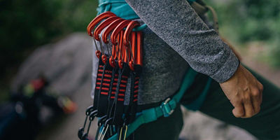 Climber with gear on their waist