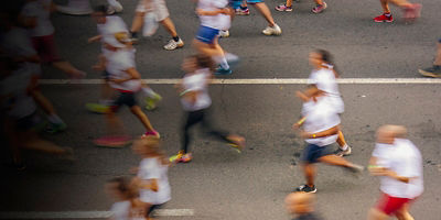 Half marathon runners on a city street