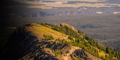 hikers hking Mount Washburn trail in Yellowstone National Park