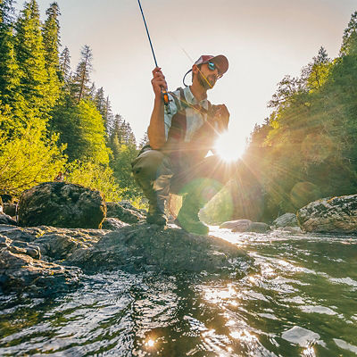 A man fly fishing on the South Fork of the Stillaguamish River, Central Cascades, Washington