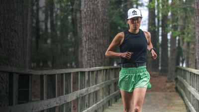 A woman running in the forest