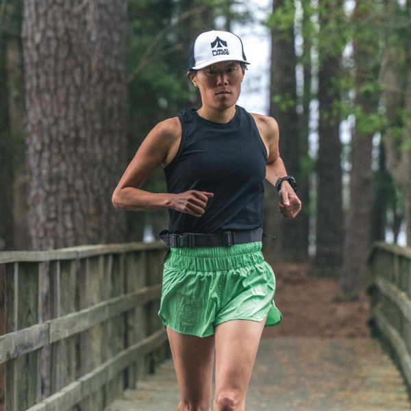 A woman running in the forest
