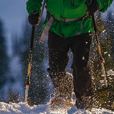 A detail photo of snowshoes in the snow
