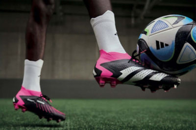 Image of a soccer player on the field in adidas Predator cleats