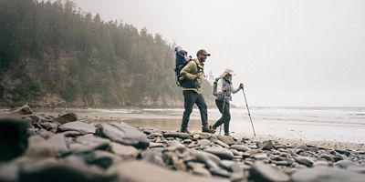 Two people walking on Portland Coast