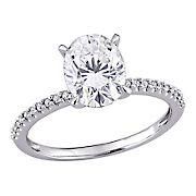 2 ct. DEW Created Moissanite and .1 ct. t.w. Diamond Oval Engagement Ring in 14k White Gold - Size 5