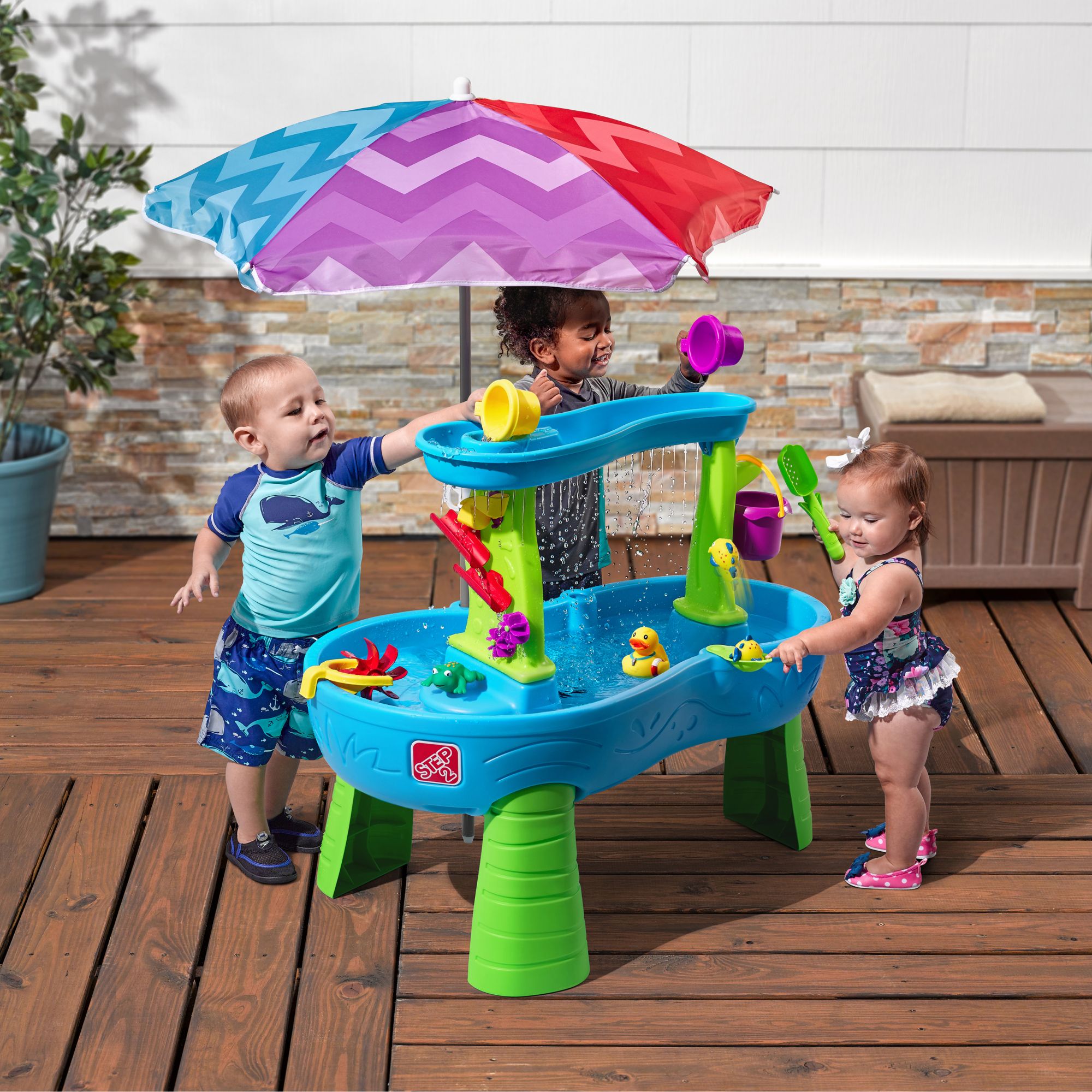 Kids water store table with umbrella