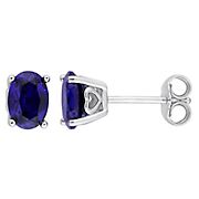2.50 ct. t.g.w. Oval Created Blue Sapphire Stud Earrings in Sterling Silver