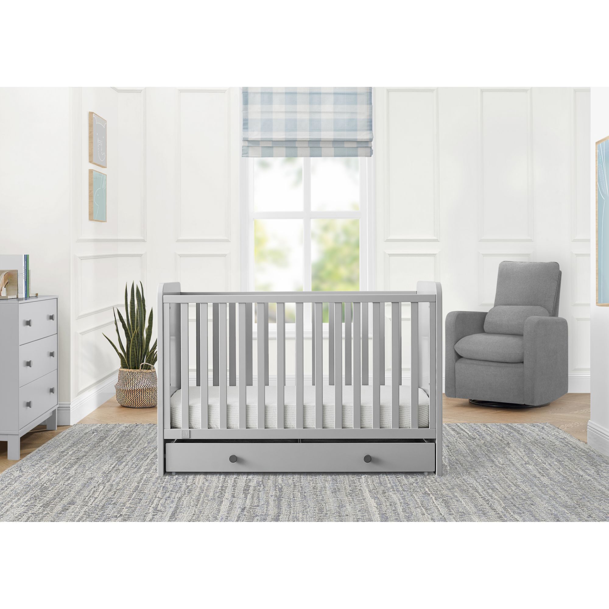 Grey crib with sales drawers