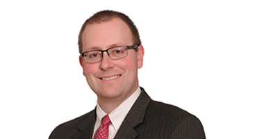 Headshot of Mike Burgess