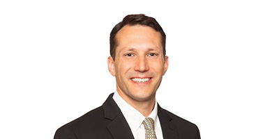 Headshot of Eddie Demosthenes