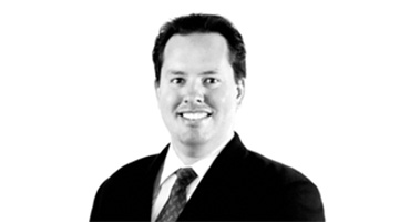 Headshot of James Hughes