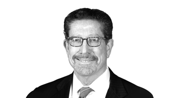 Headshot of David R Brousell