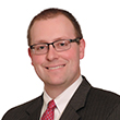 Headshot of Mike Burgess