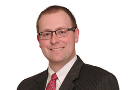 Headshot of Mike Burgess