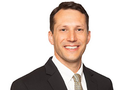 Headshot of Eddie Demosthenes