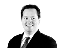 Headshot of James Hughes