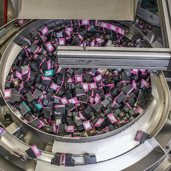 Ink cartridges undergoing recycling process in SIMs recycling facility in La Vergne, TN. Courtesy of HP, Inc.
