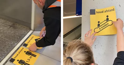 Mijksenaar signs remind passengers to keep their distance on the Dutch railway system.