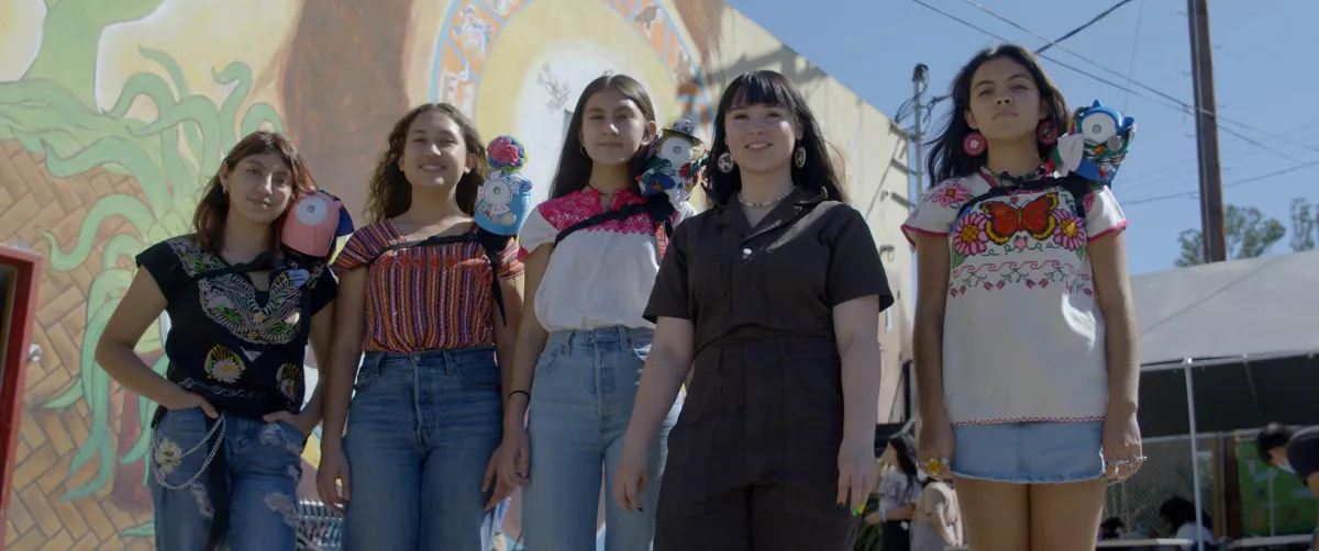 Danielle Boyer with students and their wearable SkoBots at the Anahuacalmecac International Baccalaureate World School in Los Angeles, California.
