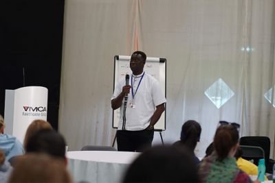 YMCA Global Secretary General Carlos Sanvee addresses a group