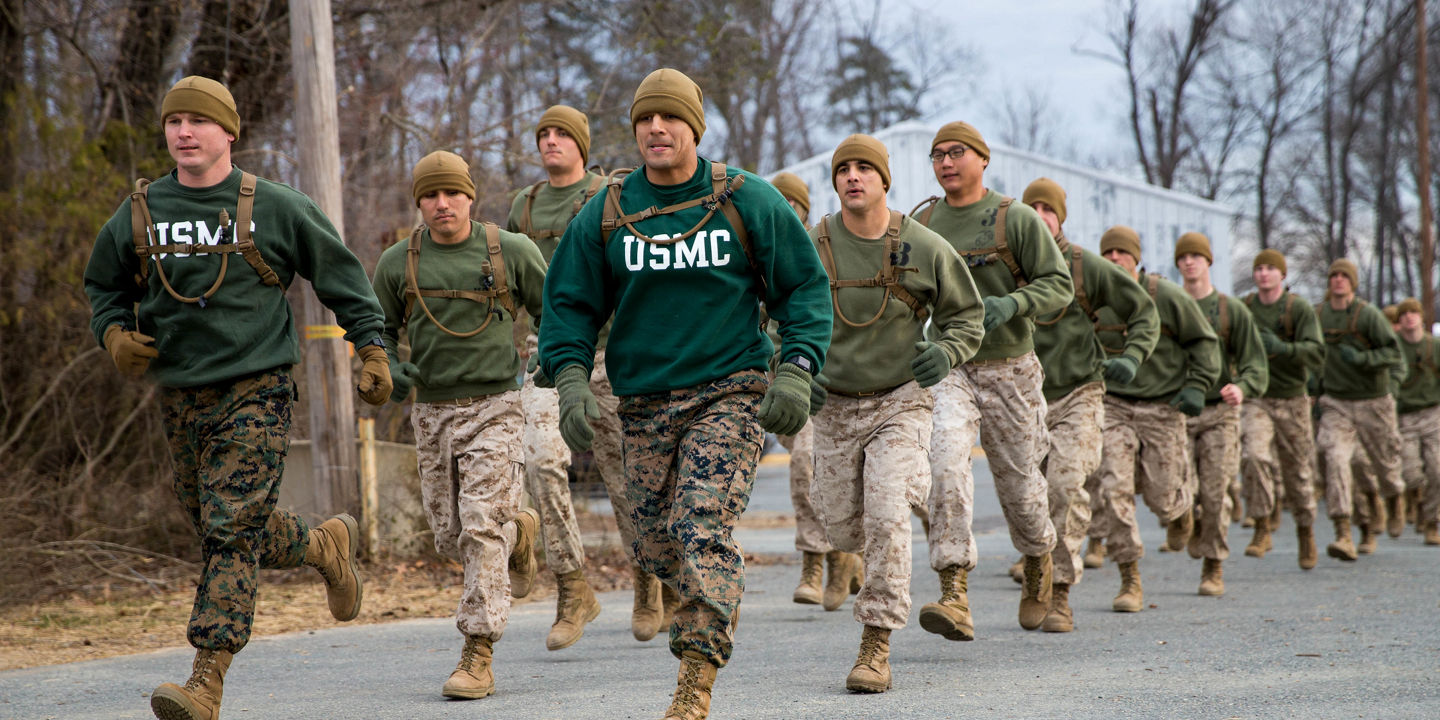 Marines complete a group run as part of their physical training and assessment.