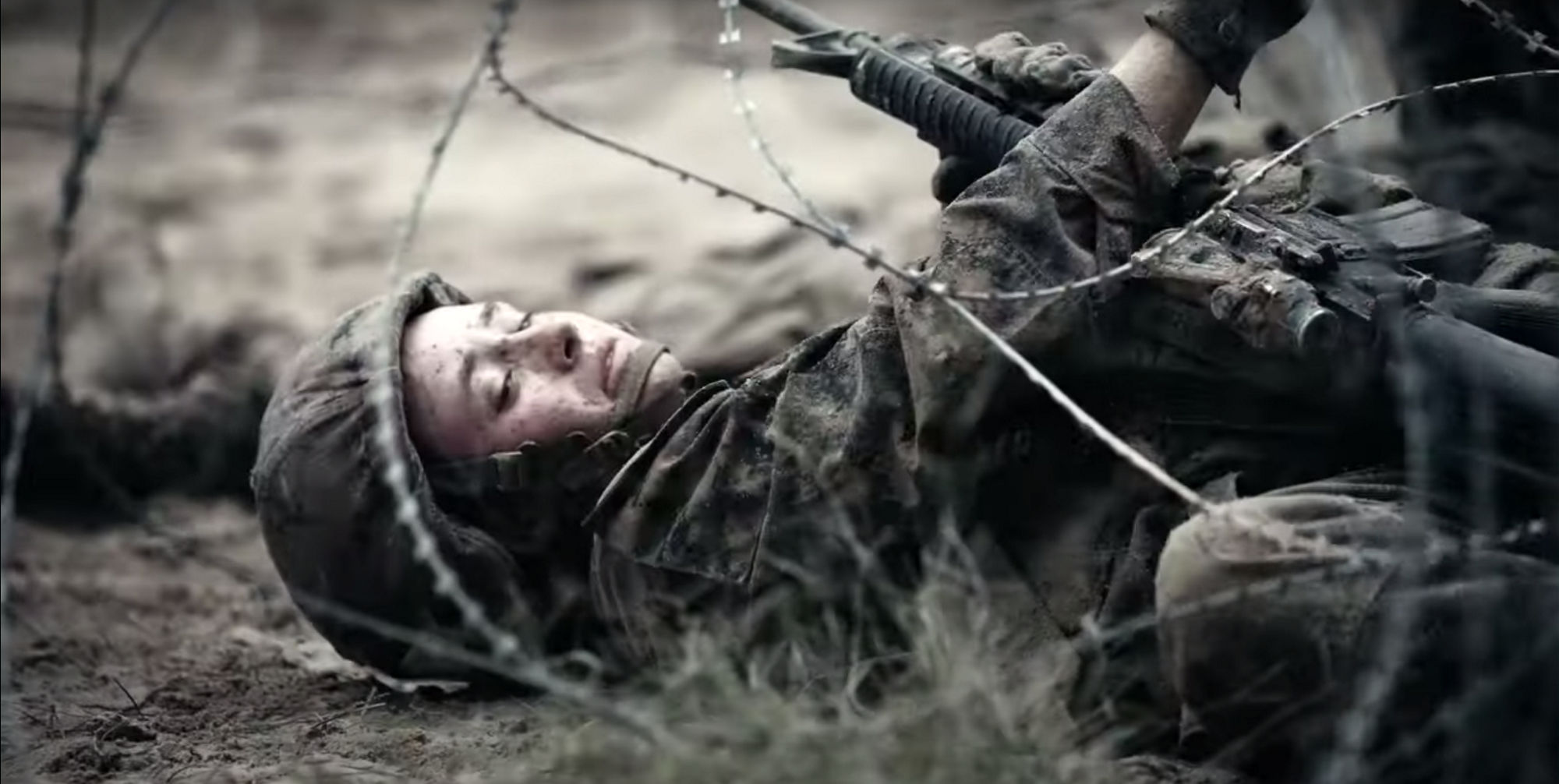 Video thumbnail showing Marine crawling through Concertina wire.