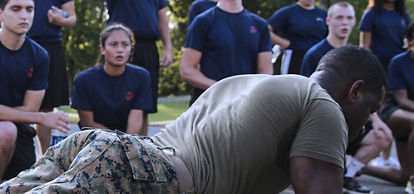 Marine doing push ups as part of a Physical Fitness Test.