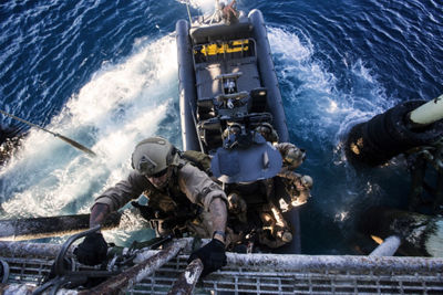 Marines boarding a ship.