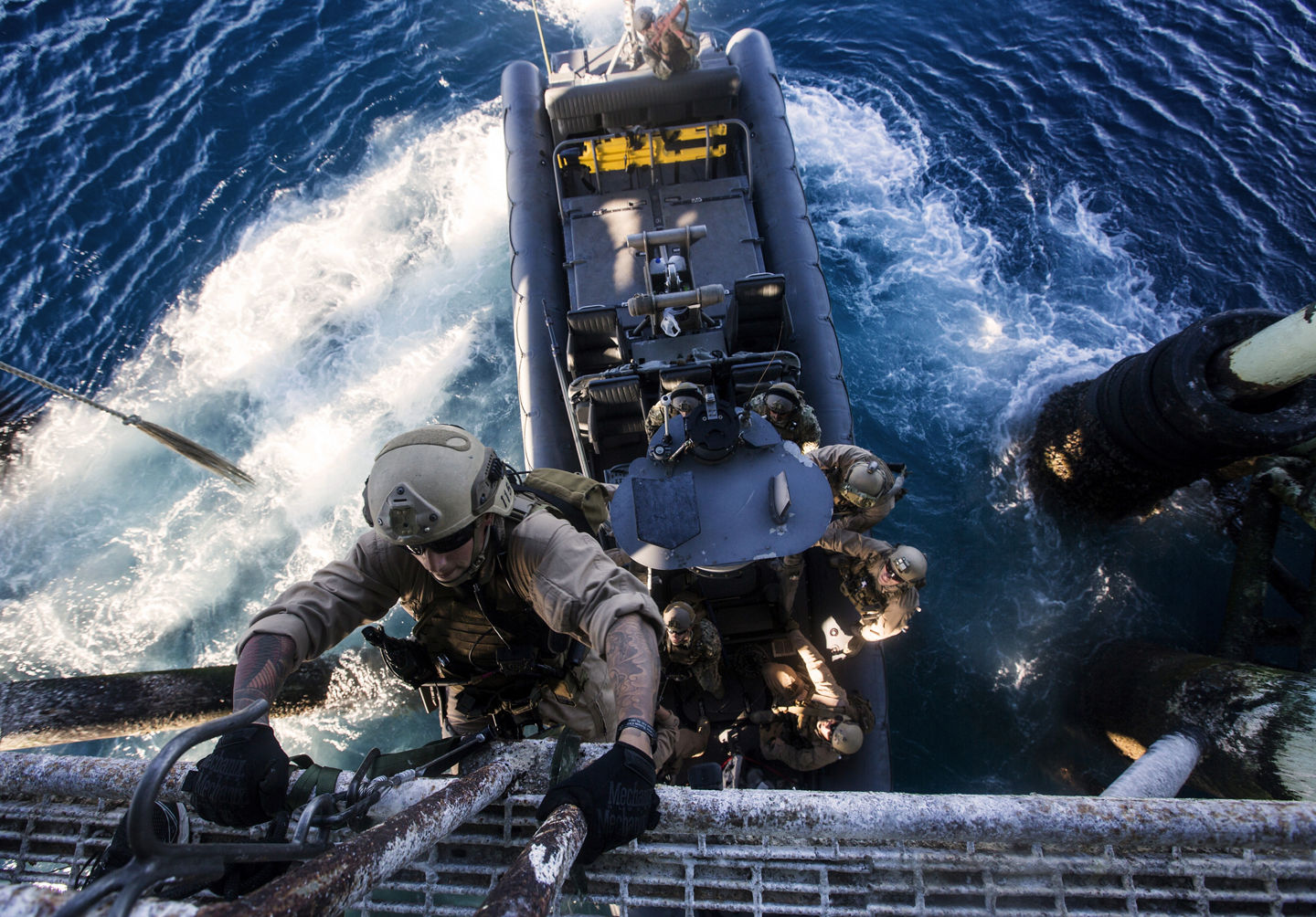 Marines boarding a ship.