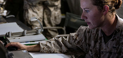 Marine training for her Military Occupational Specialty.