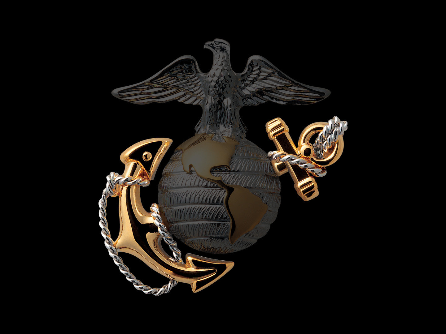 Marine Corps Eagle Globe and Anchor emblem with illuminated gold anchor against dark background.