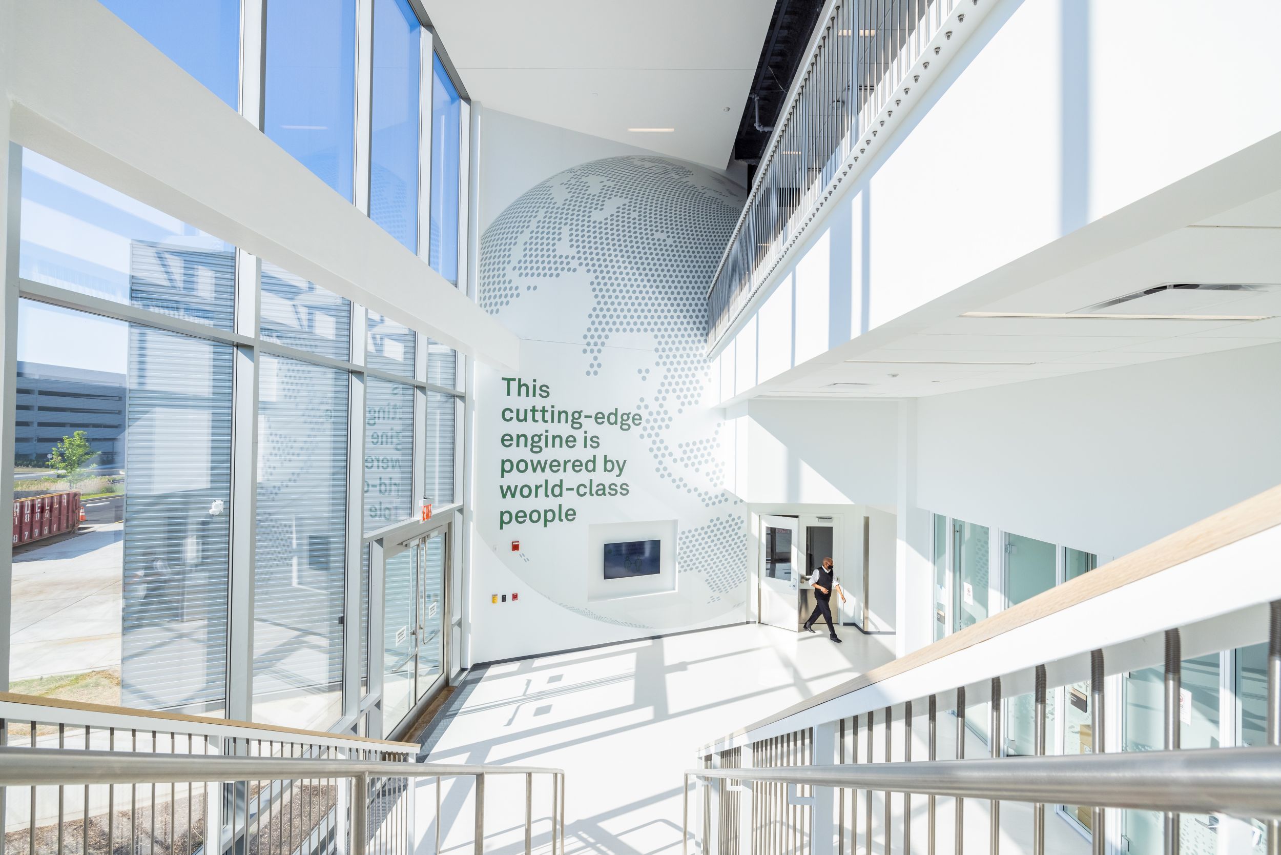 Stair Case in the Quest Clifton Lab - "This cutting-edge engine is powered by world-class people"