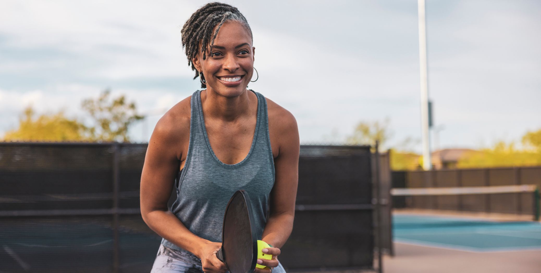 Woman playing pickleball