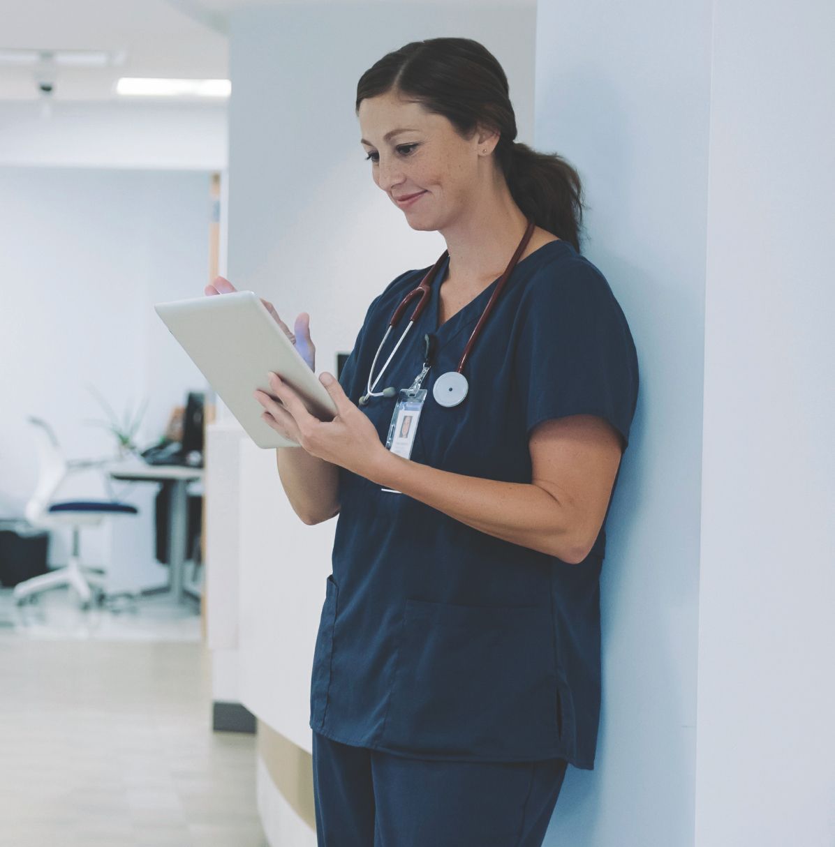 female doctor on ipad