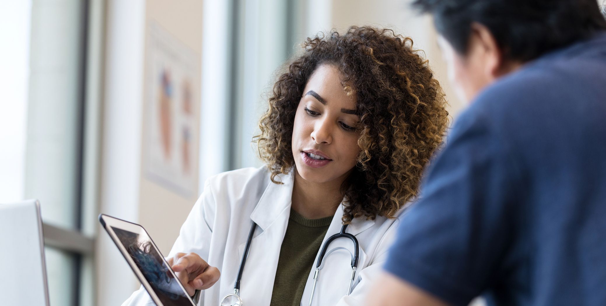 Doctor speaking with patient