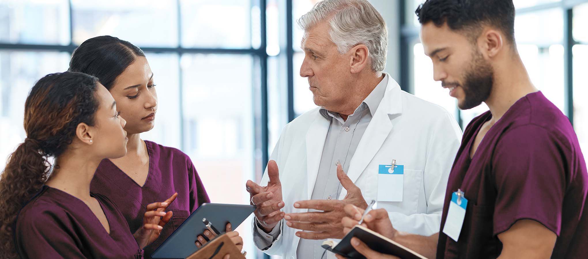 Physician having a discussion with colleagues