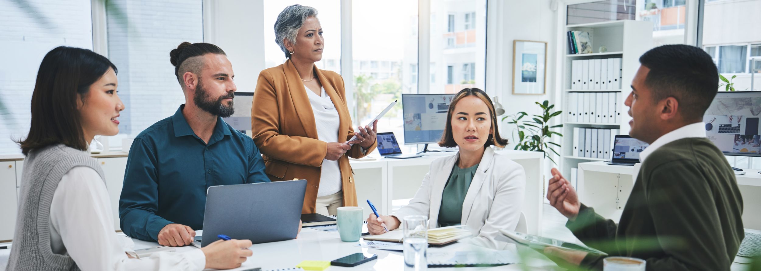 Professional Services and team of healthcare professionals working in an office