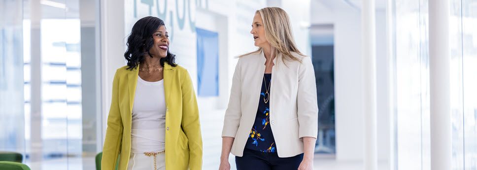 2 HR professionals discussion benefits engagement
