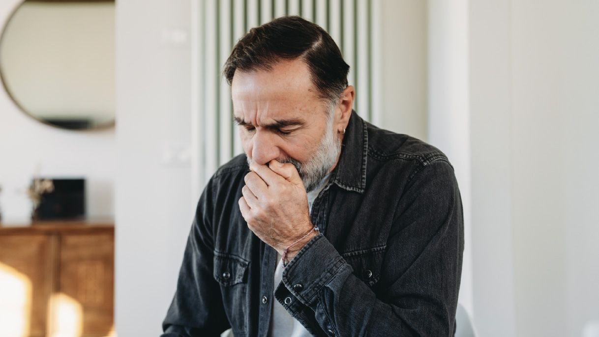 Man coughing