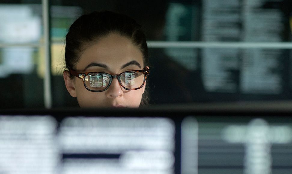 Woman looking at monitor